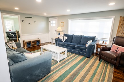 Dennisport Cape Cod vacation rental - Living room opens to dedicated office and laundry space.