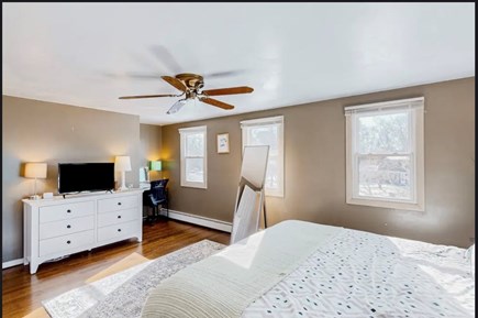 Centerville Cape Cod vacation rental - Master bedroom with King bed, TV, and desk/office