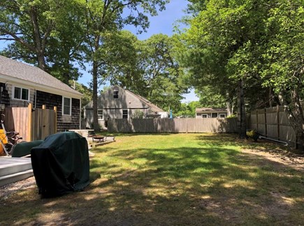 Dennis Cape Cod vacation rental - Backyard, outside shower, grill, picnic table
