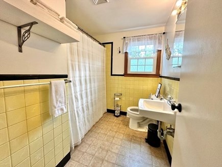 Dennis Cape Cod vacation rental - Clean, pleasant bathroom with bath tube.
