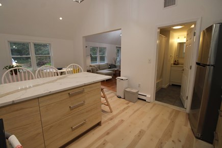 Orleans Cape Cod vacation rental - Looking from kitchen to dining and living rooms with 2nd bath