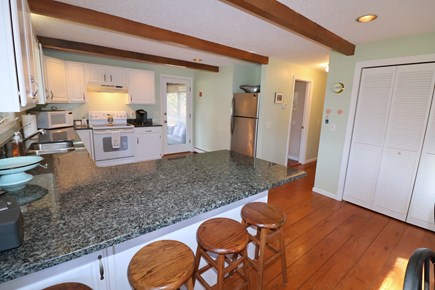 East Dennis Cape Cod vacation rental - Kitchen to Porch and bedroom area