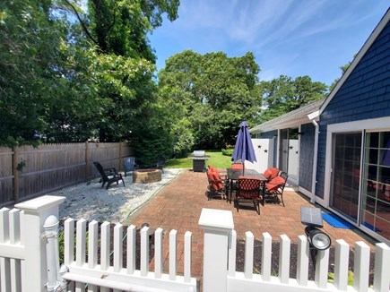 Centerville Cape Cod vacation rental - Nice backyard with additional seating, firepit and outdoor shower