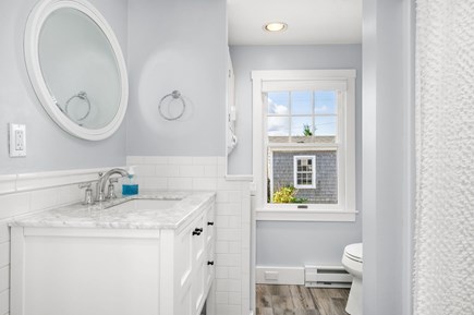 Sandwich Cape Cod vacation rental - Bathroom with shower/tub combo and washer/dryer
