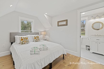 Orleans Cape Cod vacation rental - Up the spiral staircase you find this bedroom with a queen bed.