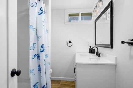 Mashpee Cape Cod vacation rental - Lower level bathroom with shower/tub combo