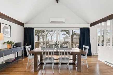 Wellfleet Cape Cod vacation rental - Dining area with large table and water views