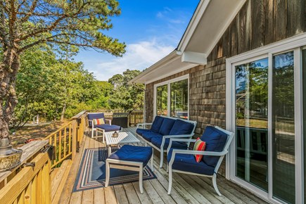 Wellfleet Cape Cod vacation rental - Front deck with outdoor furniture and water views