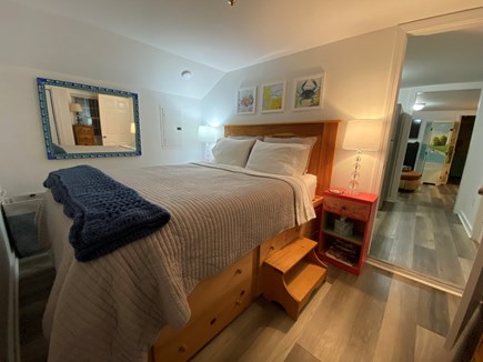 Hyannis Cape Cod vacation rental - Comfy queen bed with lots of storage in the larger bedroom.