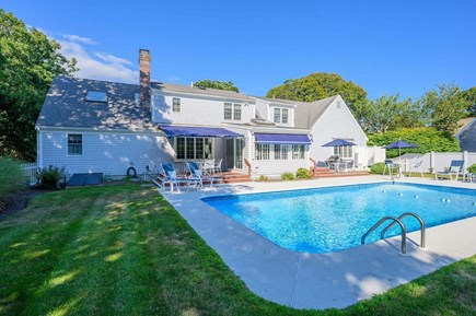 Harwich Port Cape Cod vacation rental - Pool and seating - pool is now fully fenced