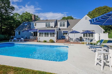 Harwich Port Cape Cod vacation rental - Pool and seating - pool is now fully fenced