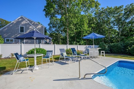 Harwich Port Cape Cod vacation rental - Pool and seating - pool is now fully fenced