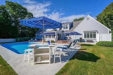 Harwich Port Cape Cod vacation rental - Pool and seating - pool is now fully fenced