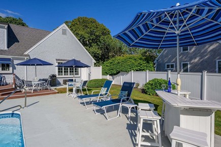 Harwich Port Cape Cod vacation rental - Pool and seating - pool is now fully fenced