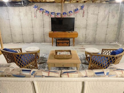 Harwich Port Cape Cod vacation rental - Flat screen TV and seating area in the lower level