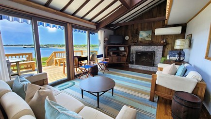 Wellfleet Cape Cod vacation rental - Living room with comfortable furniture, TV and slider to deck