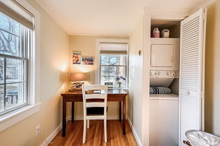 South Yarmouth Cape Cod vacation rental - Desk with laundry in closet