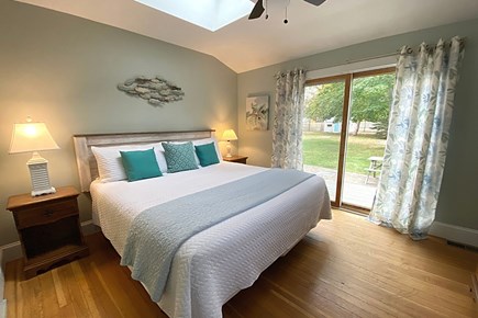 West Yarmouth Cape Cod vacation rental - First-floor Primary bedroom with King Bed and ensuite bathroom.