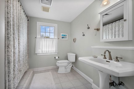 Harwich Port Cape Cod vacation rental - Bathroom with shower/tub combo