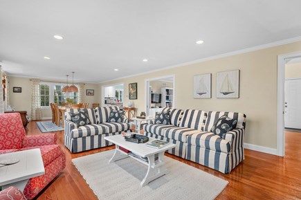 Harwich Port Cape Cod vacation rental - Living room view to adjacent dining area and kitchen - 92 Hoyt Road Harwich Port Cape Cod - Apricari - NEVR