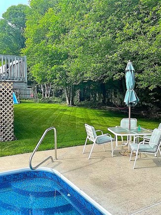 West Yarmouth Cape Cod vacation rental - Backyard with Swing Set and Slide
