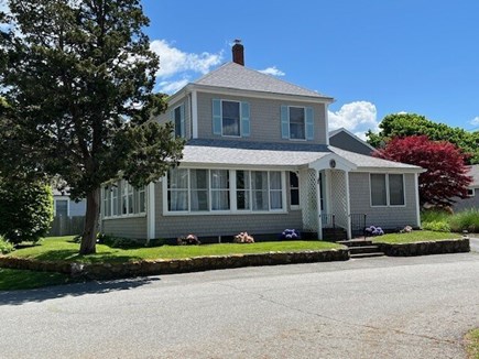 North Falmouth Cape Cod vacation rental - Front of Beach house with hydrangea, hosta, and lillies