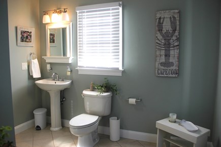 North Falmouth Cape Cod vacation rental - 1st floor bathroom with tub and shower