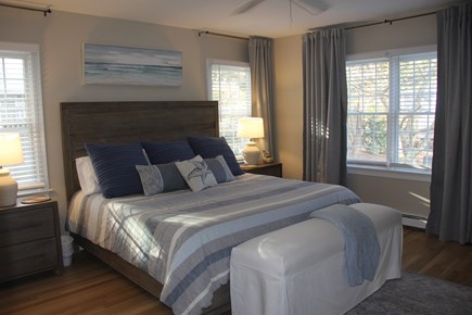 North Falmouth Cape Cod vacation rental - 1st floor Primary bedroom with King bed, desk and smart T.V.
