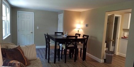 Yarmouth Cape Cod vacation rental - Dining adjoining sitting room with kitchen in back