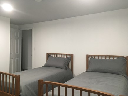 West Yarmouth Cape Cod vacation rental - Side-by-side twin beds; 2” memory foam toppers over std mattress.