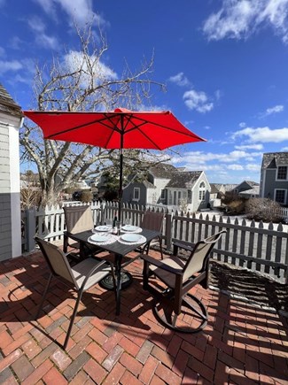 Mashpee, Maushop Village Cape Cod vacation rental - View from the deck, including table, chairs & umbrella