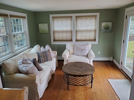Harwich Port Cape Cod vacation rental - Sunroom, queen pull out (left) french doors to deck (right)