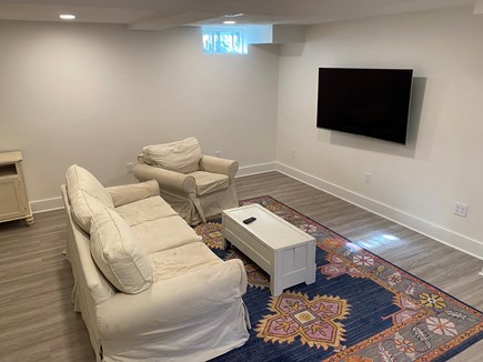 Falmouth Cape Cod vacation rental - Basement TV room with pullout couch and queen bed