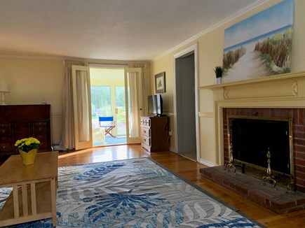 South Yarmouth Cape Cod vacation rental - Living room - walkout to screened in porch