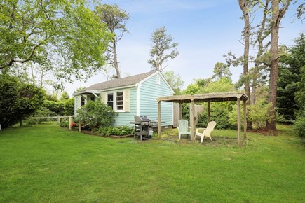 Eastham, Pine Tree Cottages Cape Cod vacation rental - Crab Shack front yard and patio