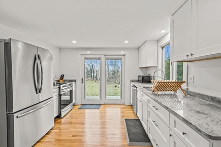 Chatham Cape Cod vacation rental - Sleek and modern kitchen with access to the backyard