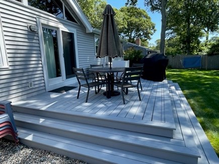 Falmouth Cape Cod vacation rental - Back Porch with Grille and patio set.