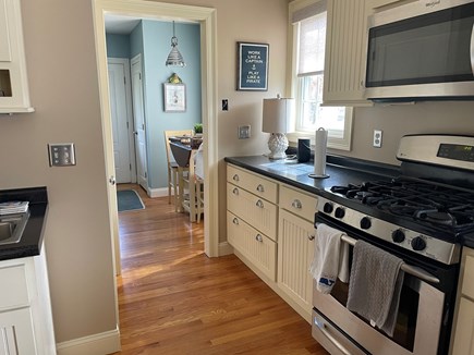 West Yarmouth Cape Cod vacation rental - Full kitchen into living room high top window view