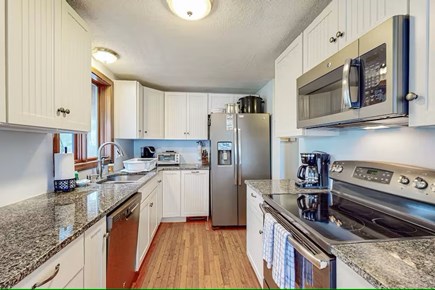 Barnstable, Hyannis Cape Cod vacation rental - Kitchen features electric range, fridge, microwave and dishwasher