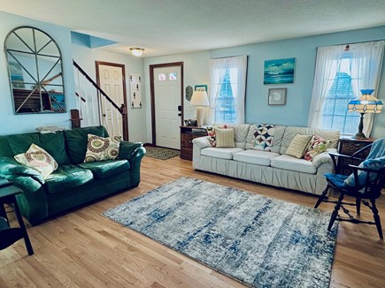 Barnstable, Hyannis Cape Cod vacation rental - The homey living room features polished hardwood floors thruout