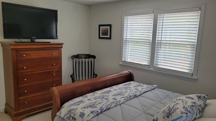 Centerville Cape Cod vacation rental - 2nd-floor primary BR with Amazon TV, queen bed, and twin bed.