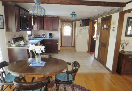 Harwich Cape Cod vacation rental - Kitchen and kitchen table from family room