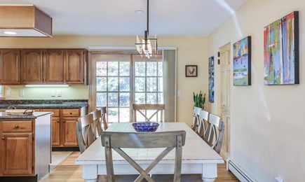 East Falmouth Cape Cod vacation rental - Dining area (and slider to outdoor entertainment)