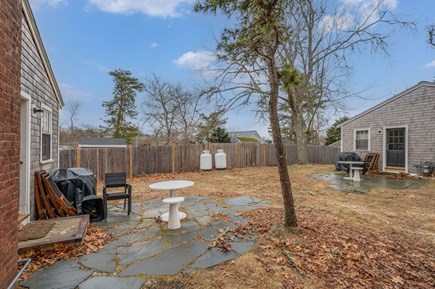Dennis Port Cape Cod vacation rental - Side yard with grill