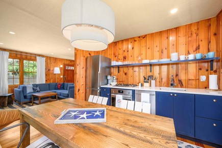 Dennis Port Cape Cod vacation rental - An angled view into the kitchen from outside the dining area