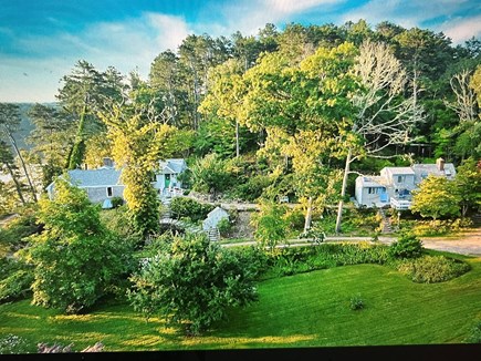 Wellfleet/Truro border Cape Cod vacation rental - Main house to the left is directly on pond, guest house on right