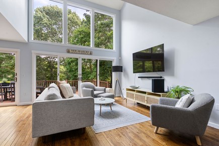 Mashpee Cape Cod vacation rental - Striking wall of windows in the living room