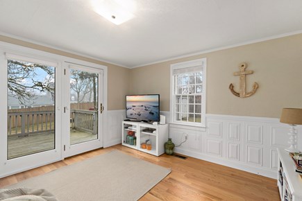 Harwich Cape Cod vacation rental - First floor bonus space with access to the deck and backyard
