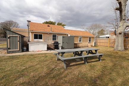 Yarmouth Cape Cod vacation rental - Exterior (picnic table, outdoor shower, lawn area)