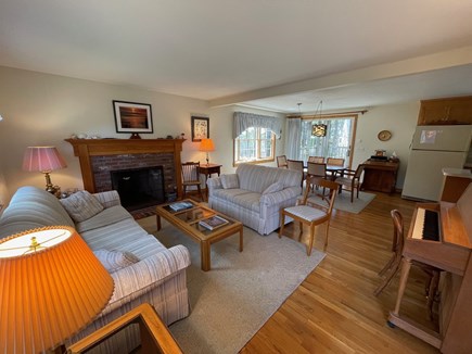 Eastham Cape Cod vacation rental - Open floor plan with connected living, dining, and kitchen.